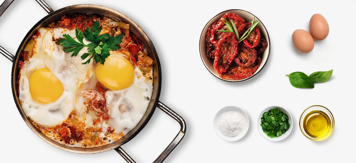 Sun-Dried Tomato and Herb Baked Eggs and ingredients image