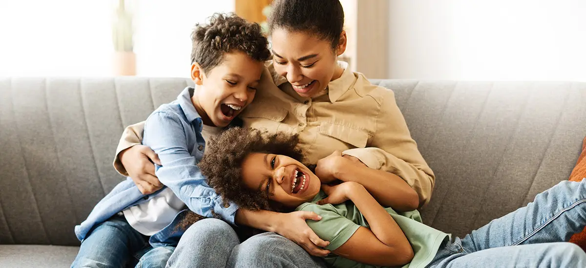 mom and kids on sofa